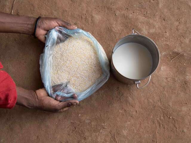 The IRC’s cash assistance program has been critical in helping mothers buy nutritious food and prevent their children from becoming malnourished. Pictured here is maize powder and milk, purchased by Nurad.